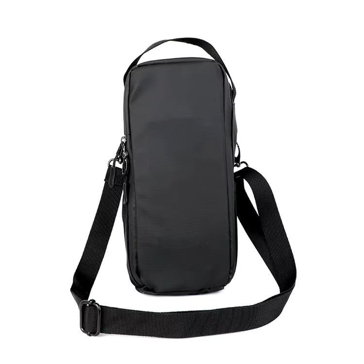 Black crossbody bag on a white background